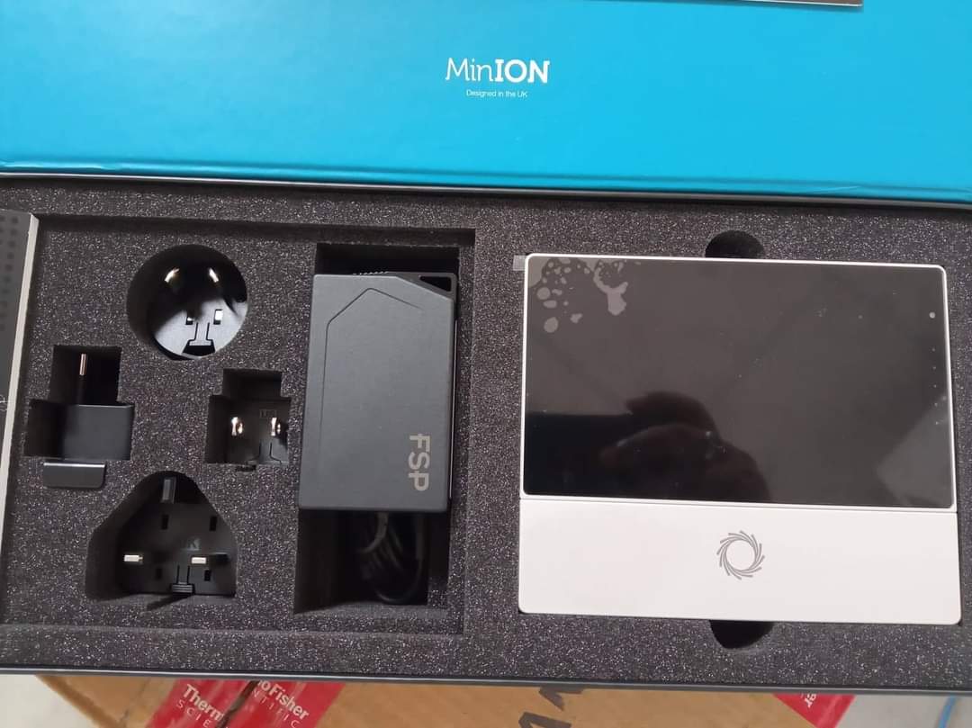 The box having the MinION sequencing device, Power adapter (FSP),Interchangeable international plugs- widely used in clinical mycology, genomics, and rapid pathogen surveillance