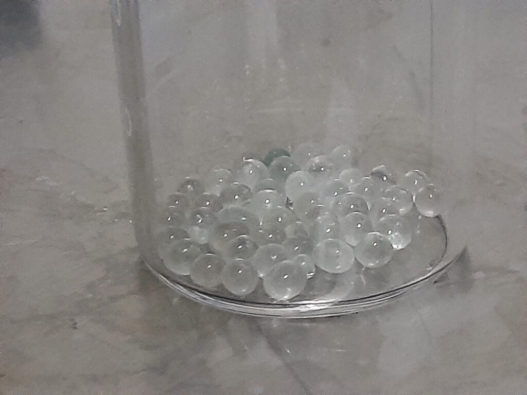 Sterile glass beads used for sample homogenization and bacterial culture preservation in a TB laboratory
