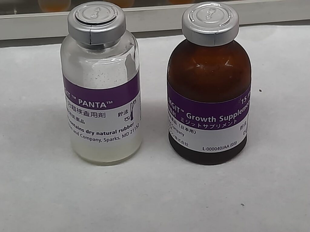 Vials of MGIT PANTA antibiotic supplement and MGIT Growth Supplement for suppressing contamination and enriching Mycobacterium tuberculosis