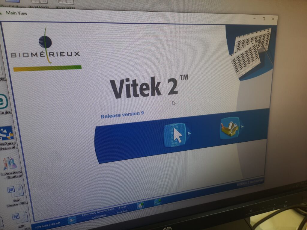 The main login screen of the bioMérieux VITEK 2 Release version 9 software, an automated system used for rapid microbial identification and antimicrobial susceptibility testing