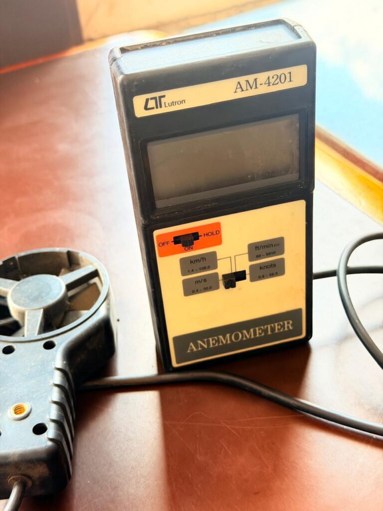 A portable digital vane anemometer used for measuring air velocity across multiple measurement units