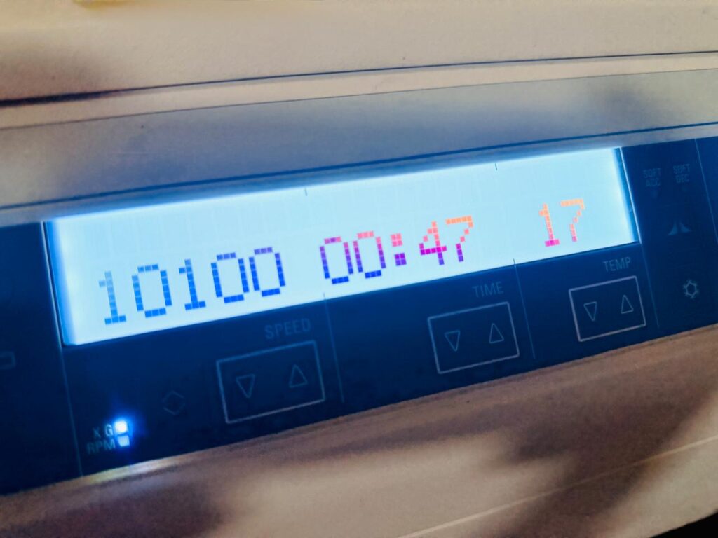 Centrifuging at 10,100 x g for 1 minute